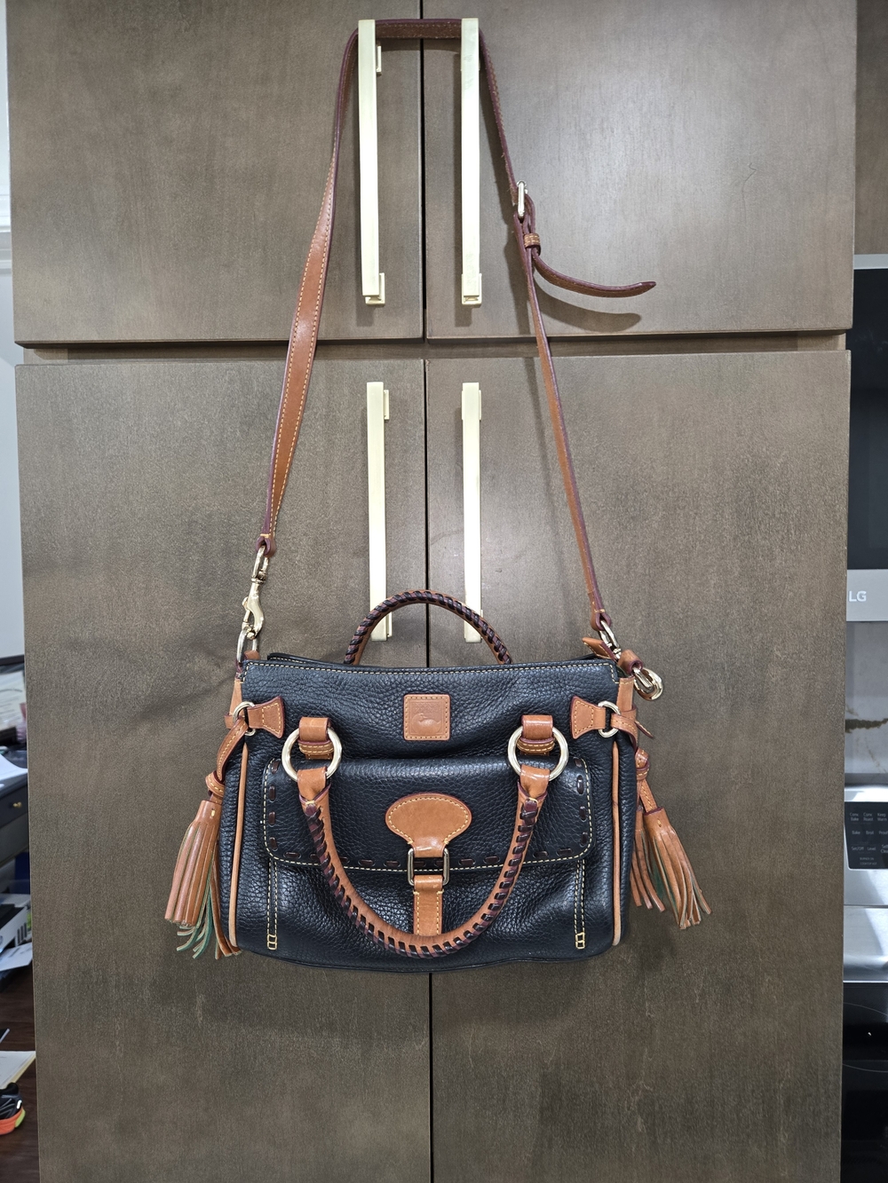 Dooney & Bourke Black Leather Satchel with Tan Trim